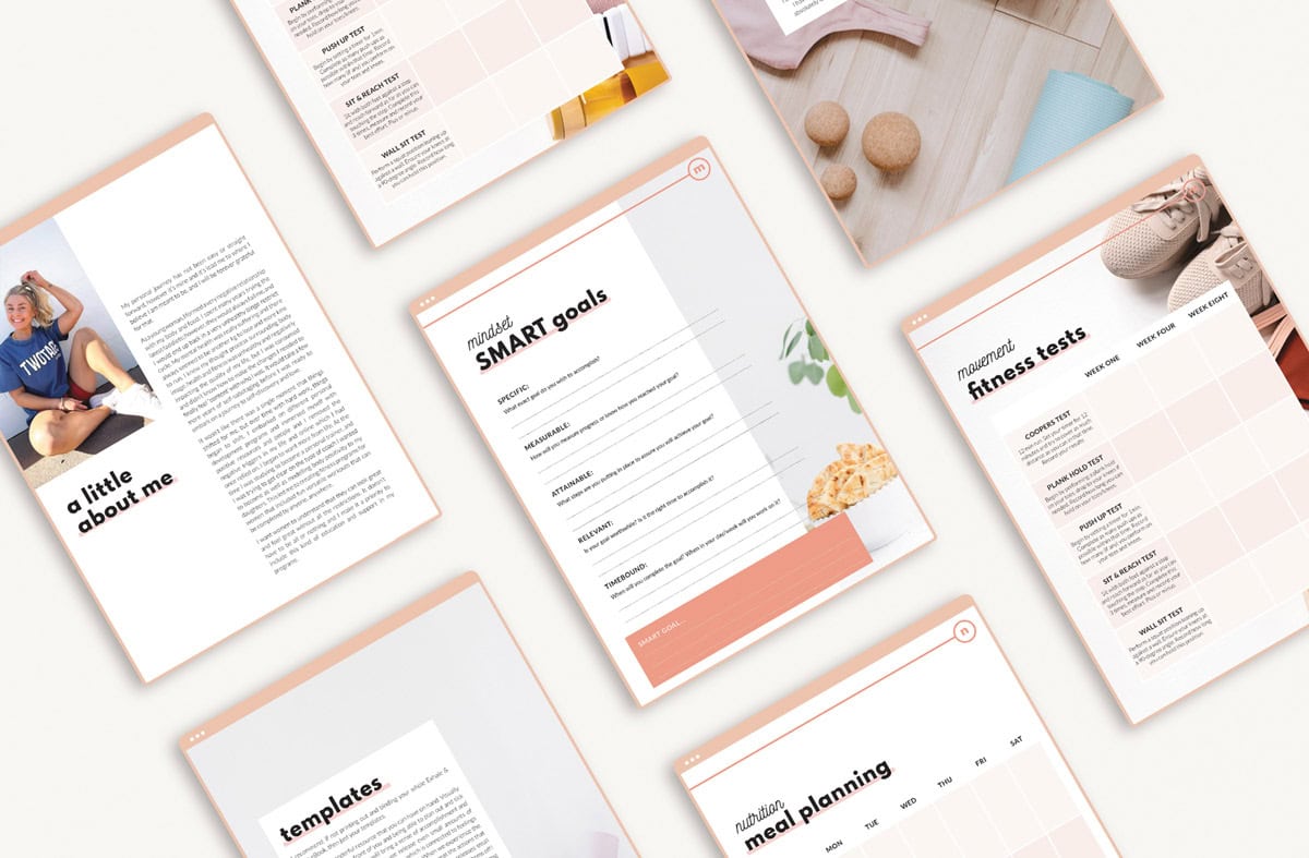 A flat lay of printed wellness planner pages with ebook design elements, featuring sections for fitness tests, SMART goals, meal planning, templates, and a personal introduction, all arranged on a white surface.